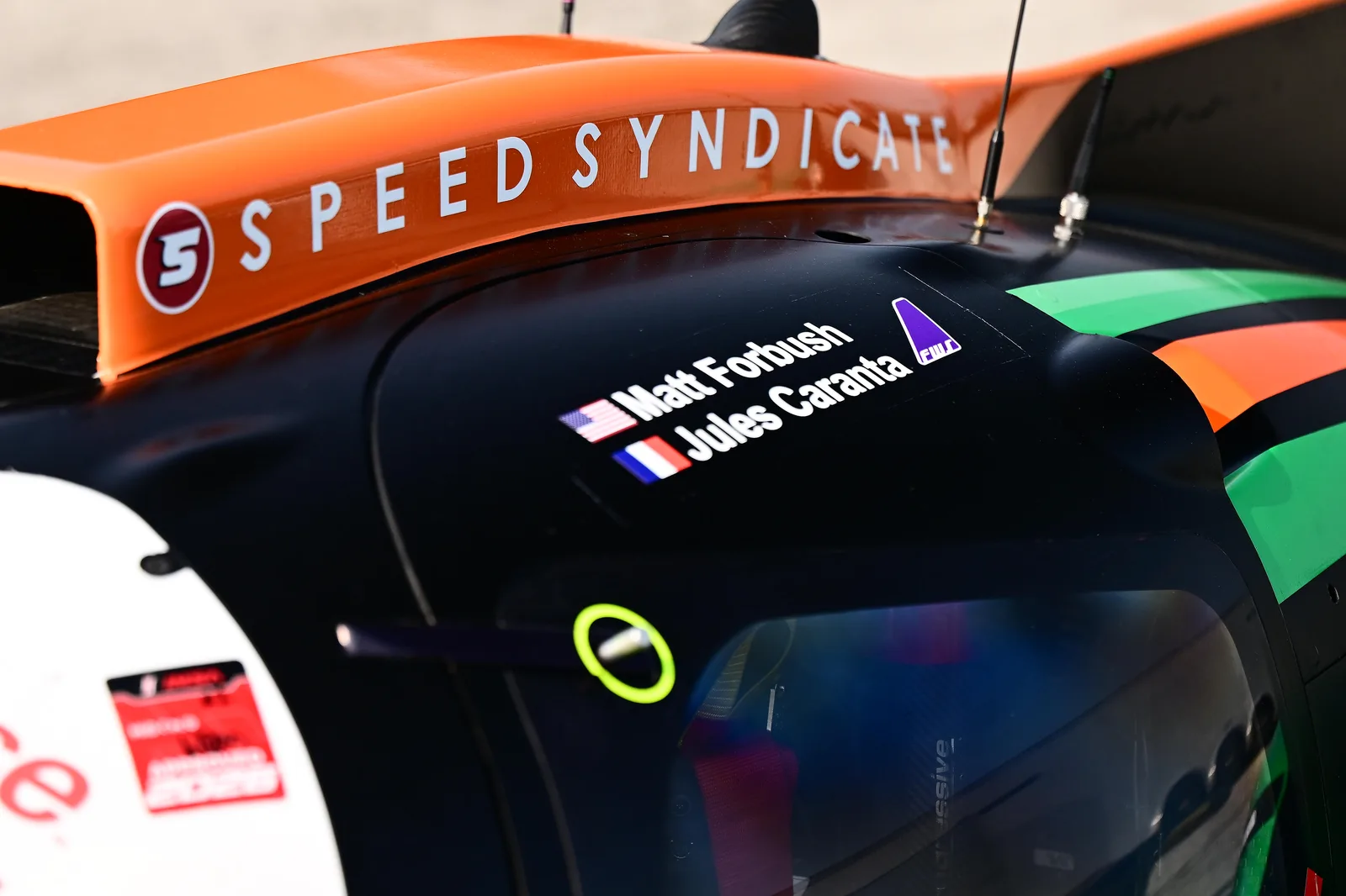 Matt Forbush and Jules Caranta's names on the No. 18 cockpit