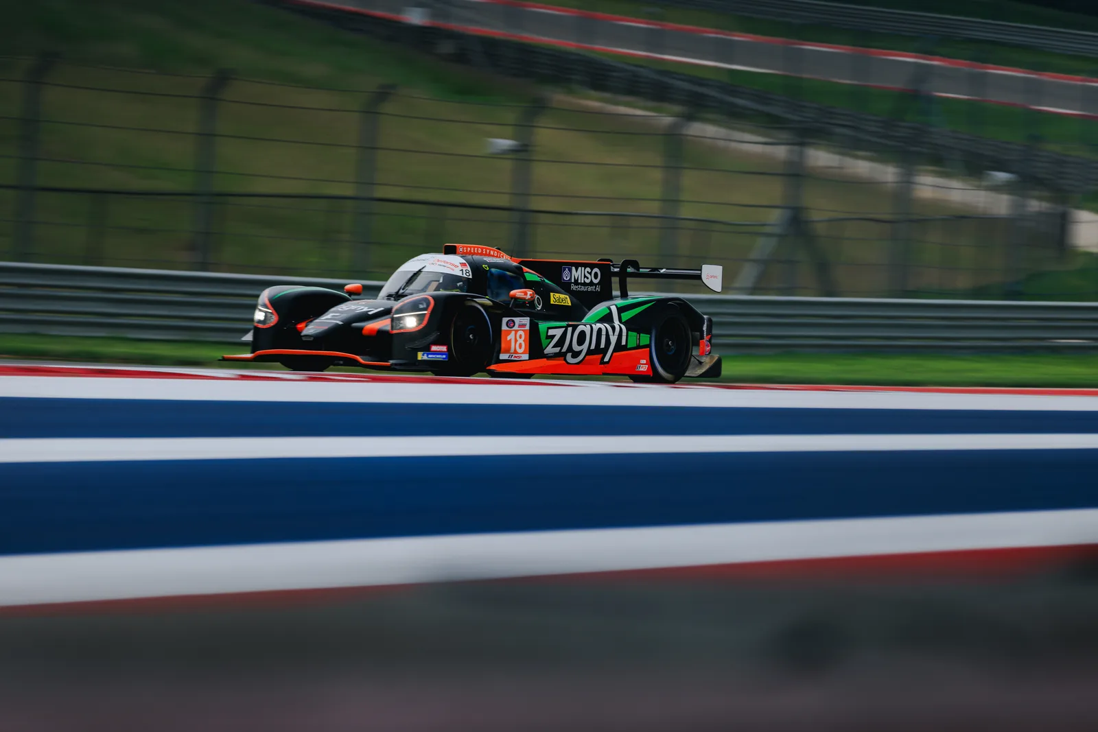 The No. 18 Forbush Performance car racing at Circuit of the Americas