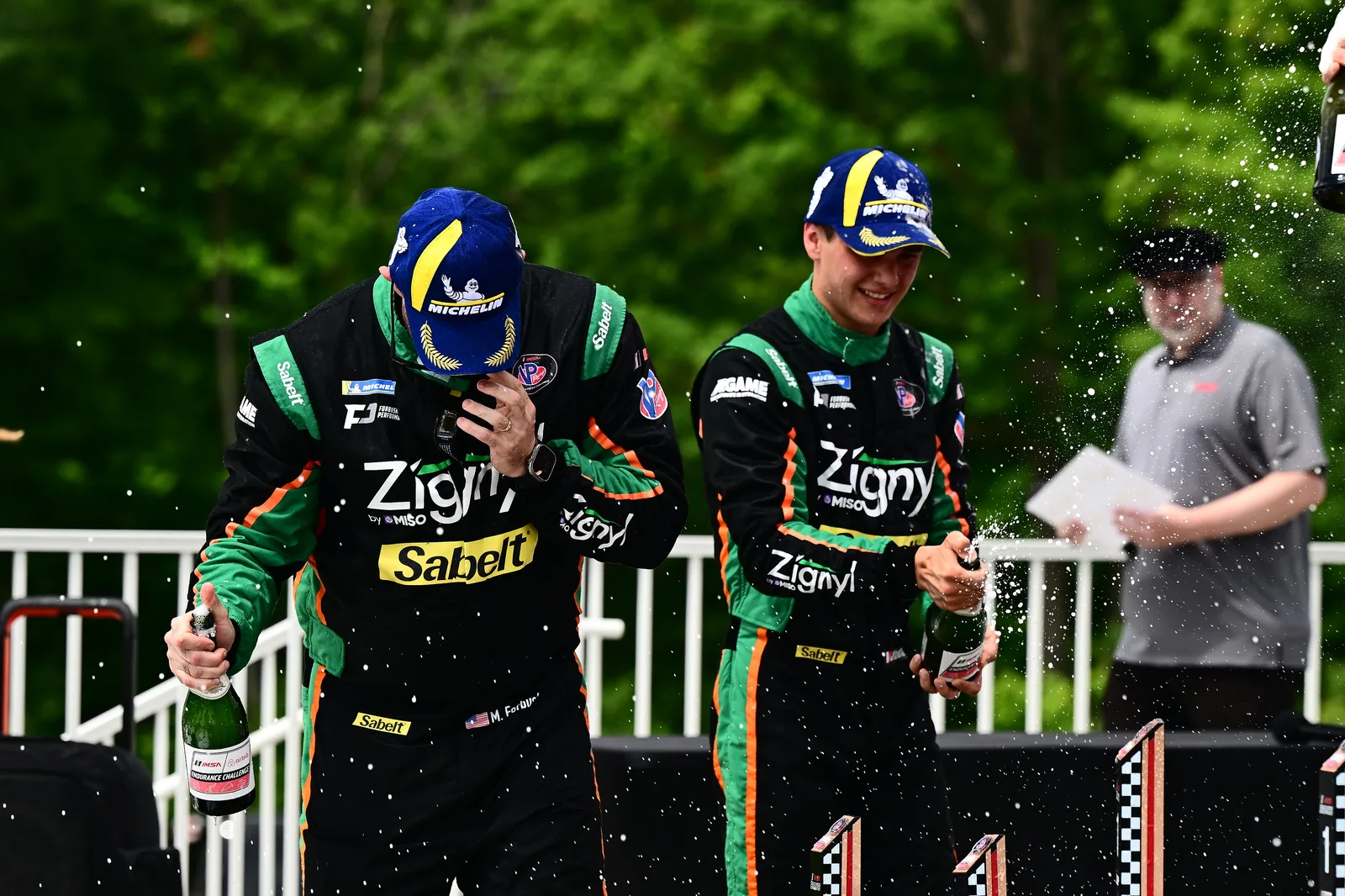 Matt Forbush and Jules Caranta celebrate their third-place finish at Road America