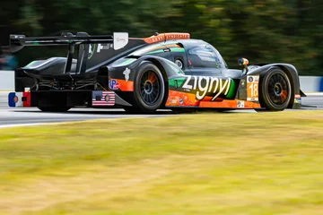 Low rear three-quarter view of the No. 18 Duqueine with Zignyl livery at Road Atlanta.